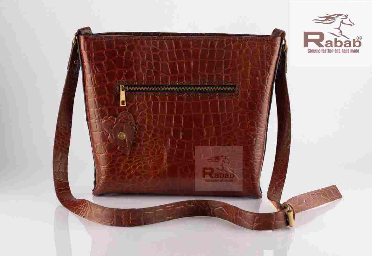 Handmade natural leather bag of cowhide with crocodile print