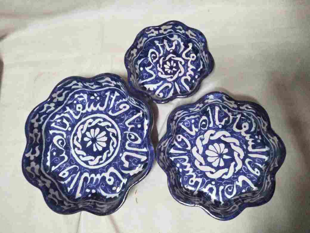 A set of porcelain dishes in the shape of a rose