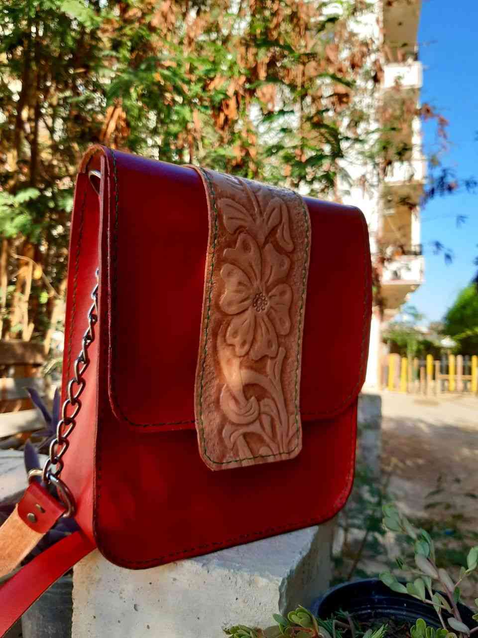 Genuine cowhide leather women's bag, the face of the bag is hand-engraved on the leather