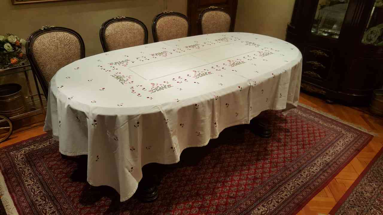 A dining tablecloth made of wool and contains 12 towels