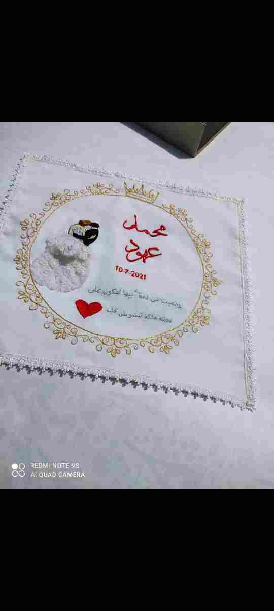 Handmade wedding handkerchief in Joubert Rosaline fabric with Maloney threads.