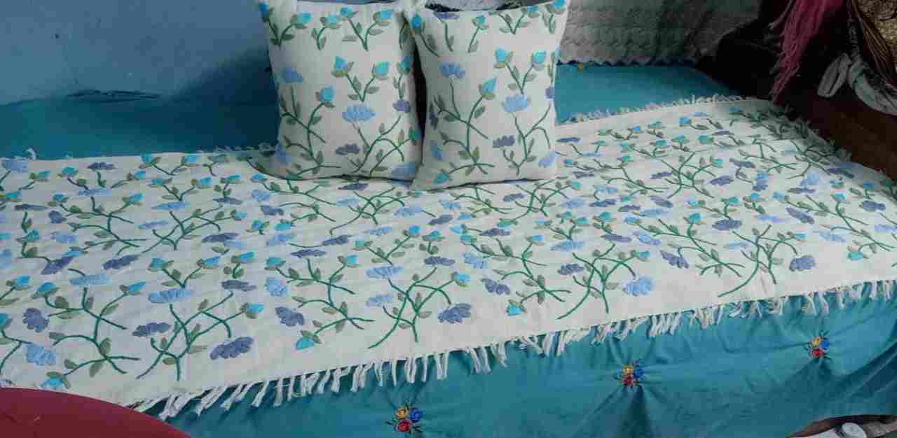 Embroidered bed runner