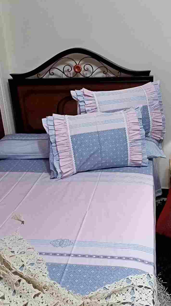 Bed set consisting of a sheet, a long pillow and 2 pillows