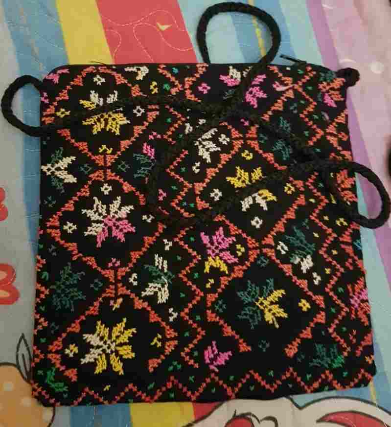 A cross bag made of tamping cloth
