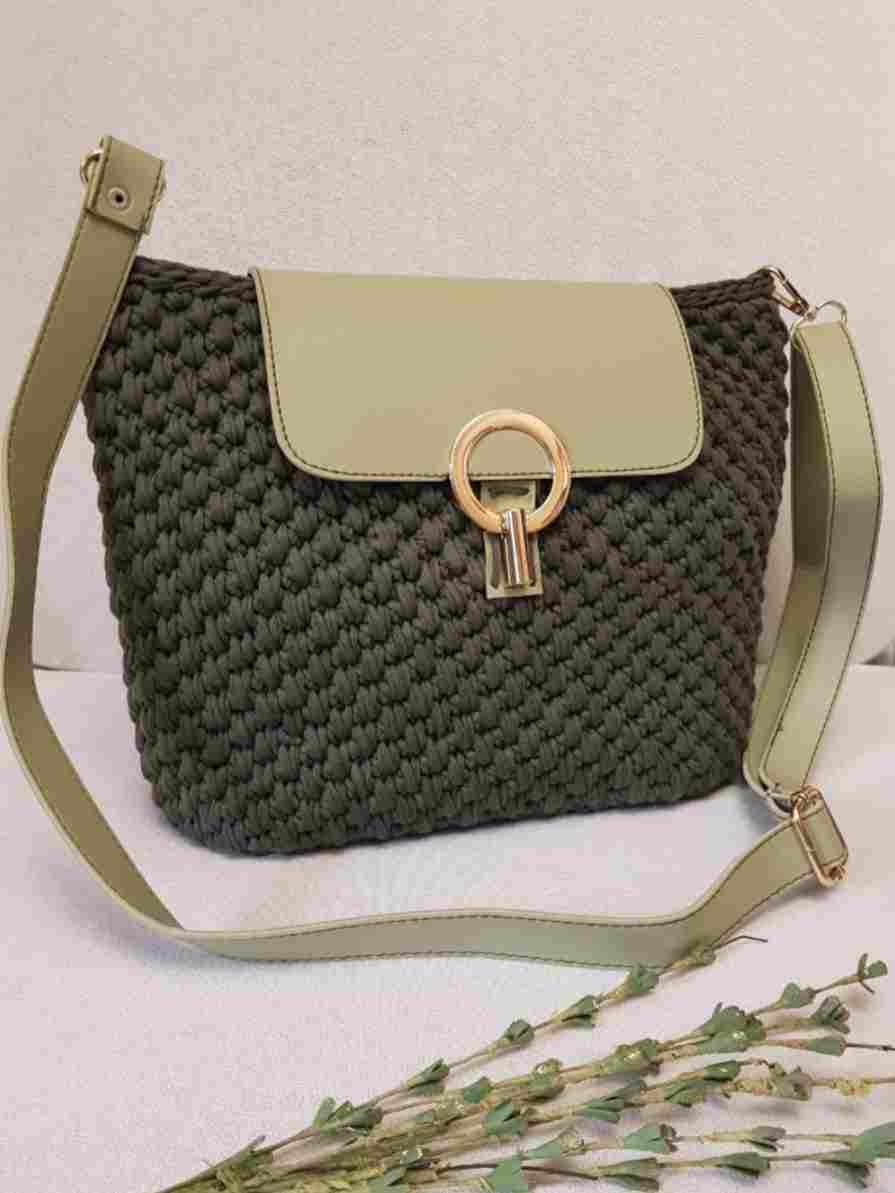 A handbag made of kilim thread with a leather hand lined inside